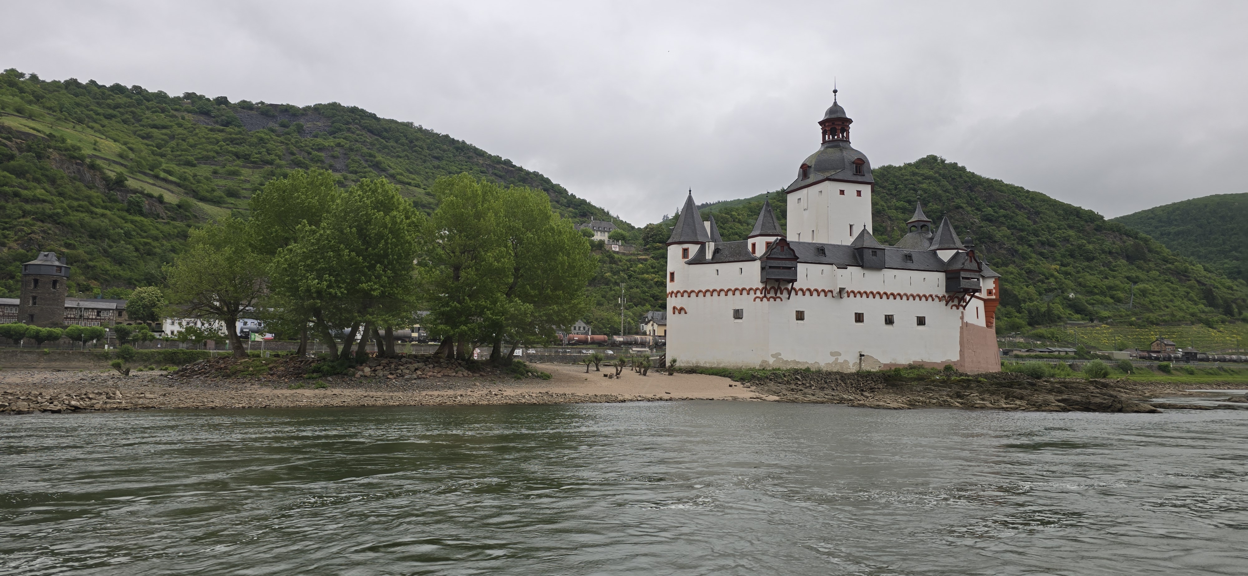 Burg Pfalzgrafenstein on its Rhine island at Kaub seen from the approaching cruise boat, the ice-breaker prow facing upstream