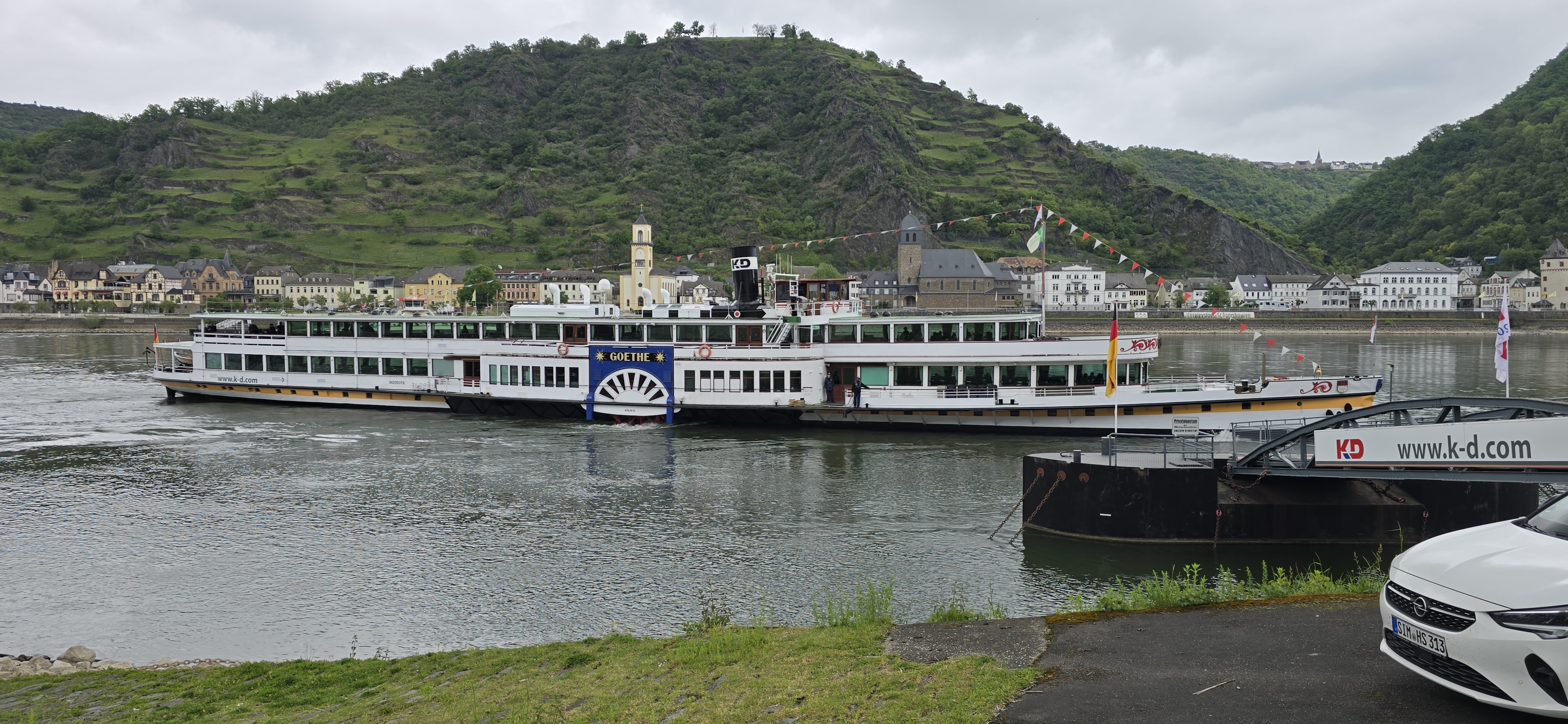 The KD paddle steamer Goethe moored at the St. Goar Anlegestelle on the Rhine, Art Deco styling, large side wheels, GOETHE painted across the bow