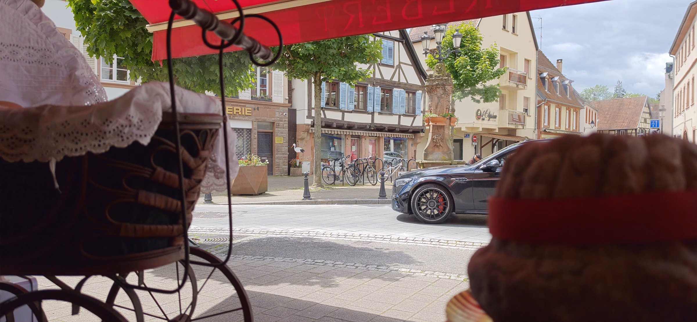 View from inside the Daniel Rebert tea salon looking out onto the half-timbered houses of Wissembourg