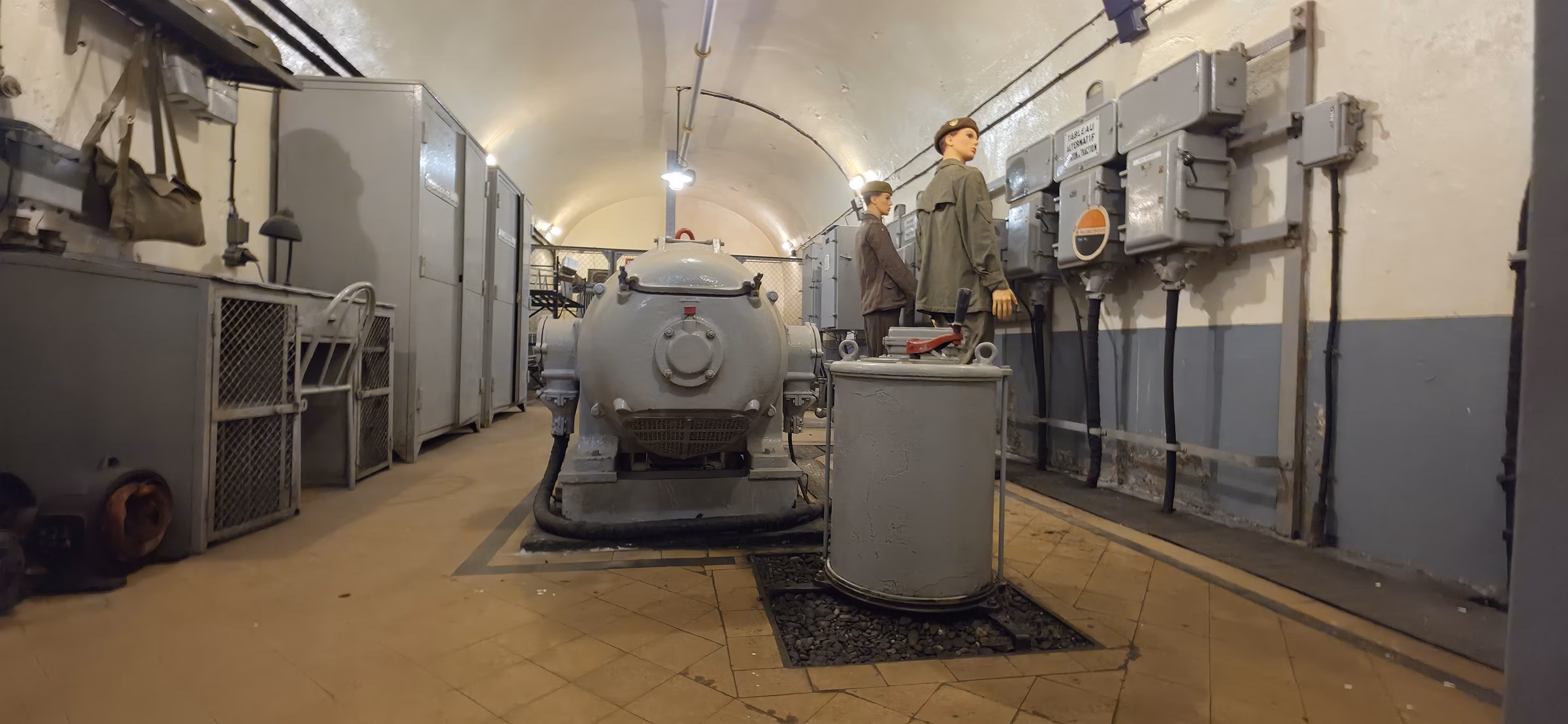 Three of the original Sulzer 165-horsepower diesel generators in the electrical plant at Fort Schoenenbourg, still in place