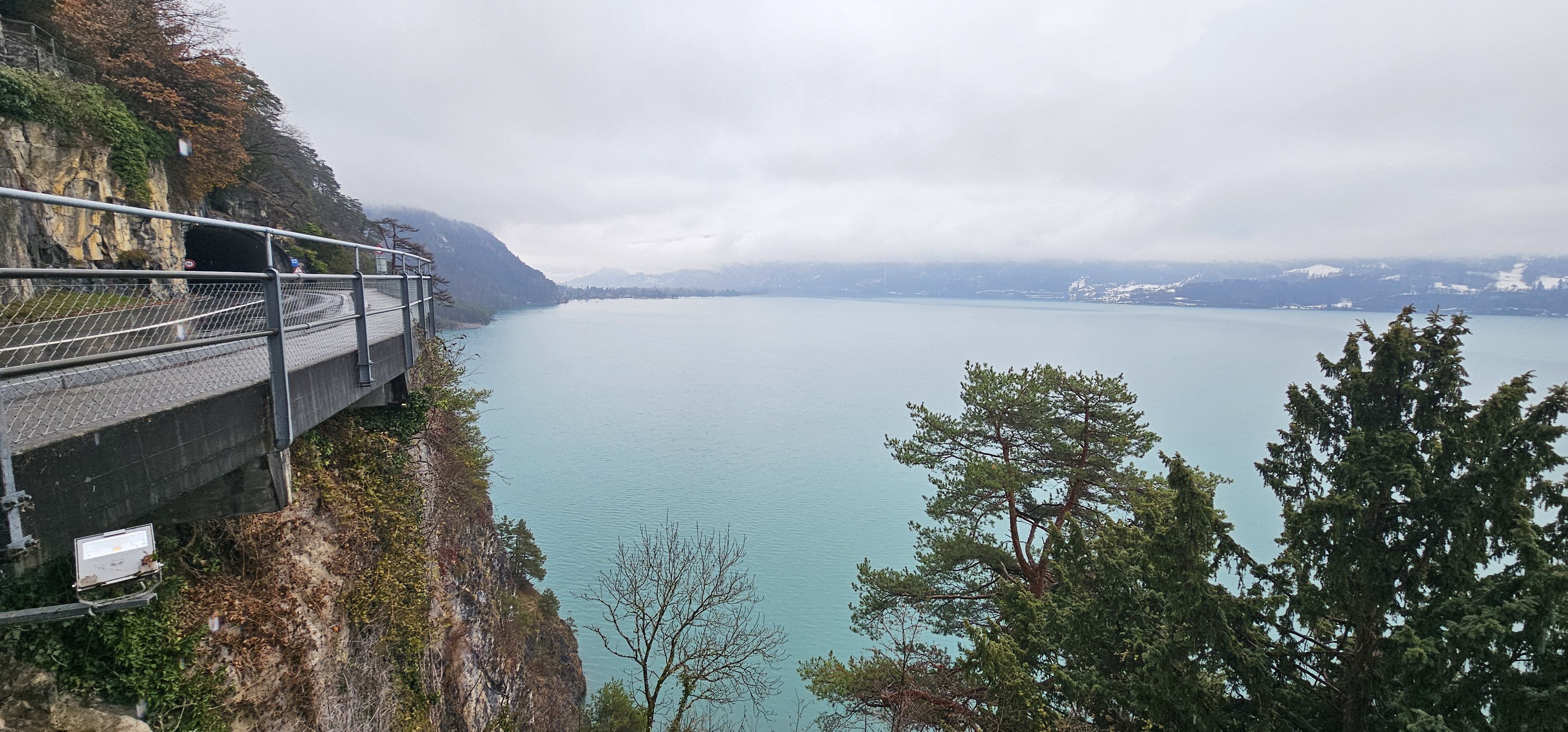 The lake-side approach footbridge to St. Beatus Caves Lake Thun on a cold December morning