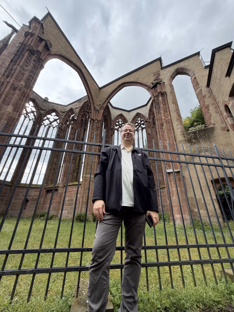 The roofless Werner Chapel with its Gothic window arches open to the sky